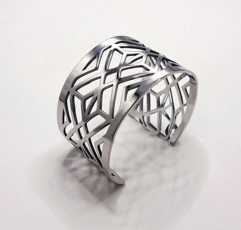 Elegant Silver-Plated Stainless Steel Bracelet With Intricate Pattern Designs